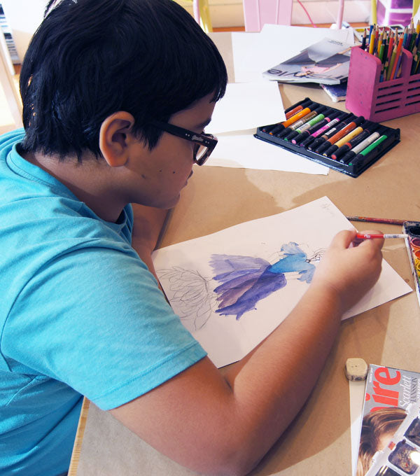 Boy Painting Fashion Illusration at The Fashion Class NYC