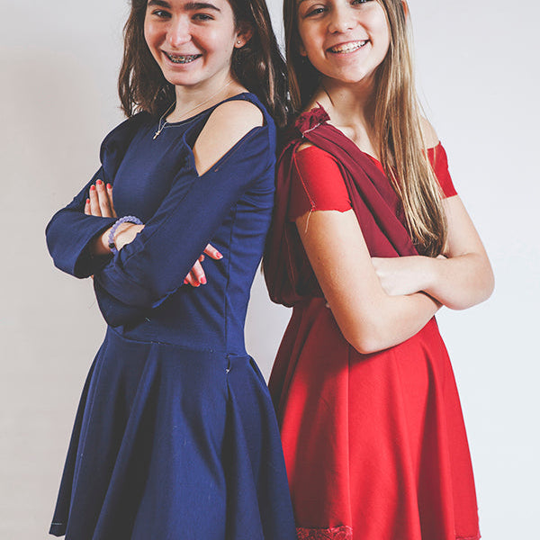 Two Girls Smiling and Posing for a Photo